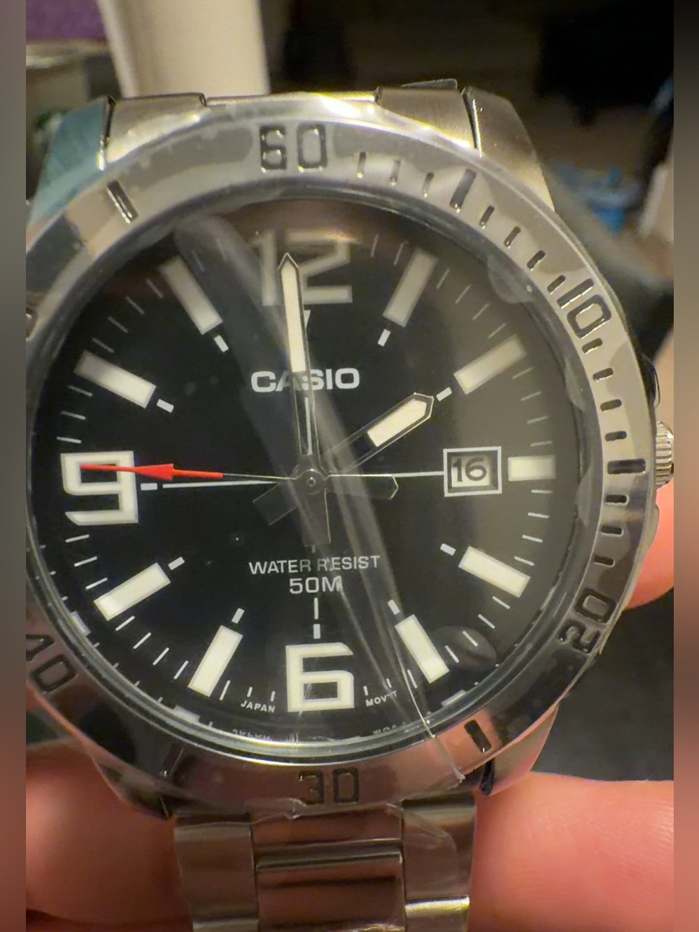 Casio Silver Stainless Steel Watch with Black Dial and Red Accent